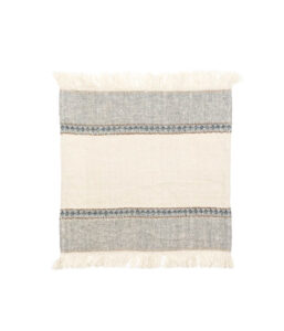 Rectangular woven rug with a cream center, gray striped sections, and fringed ends
